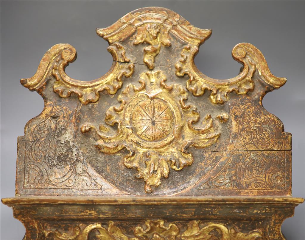 An 18th century Spanish carved and gilded book stand, width 42cm height 37cm